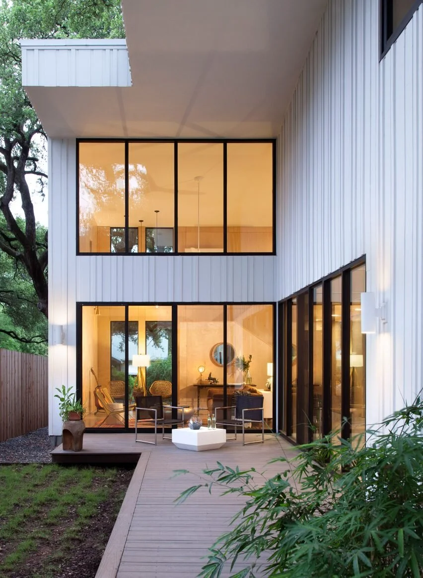 Dezeen — Vertical strips surround white Barcode House in Austin by Webber + Studio