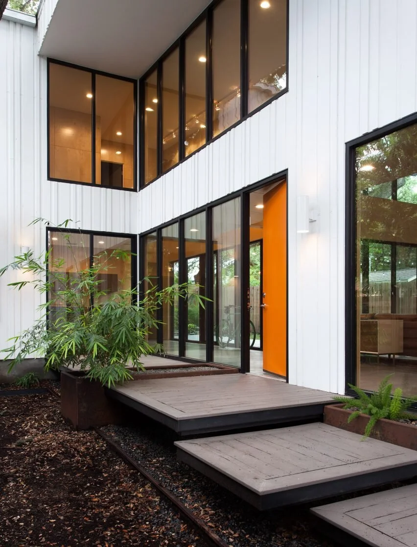 Dezeen — Vertical strips surround white Barcode House in Austin by Webber + Studio (5 of 12)
